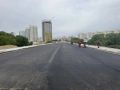 На новом ульяновском мосту через Свиягу уложили нижний слой асфальтобетона